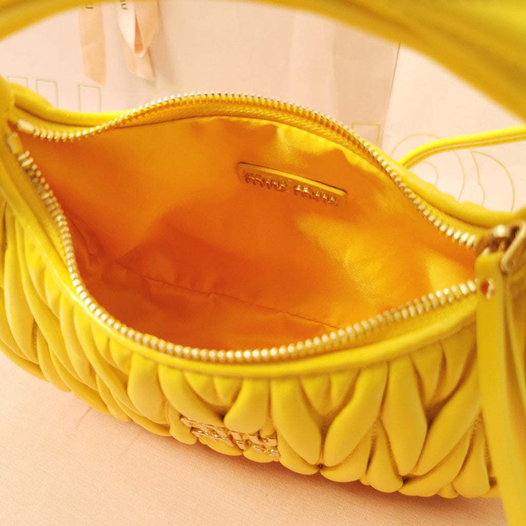 WANDER MATELASSÉ NAPPA HOBO BAG 23 IN YELLOW LAMBSKIN