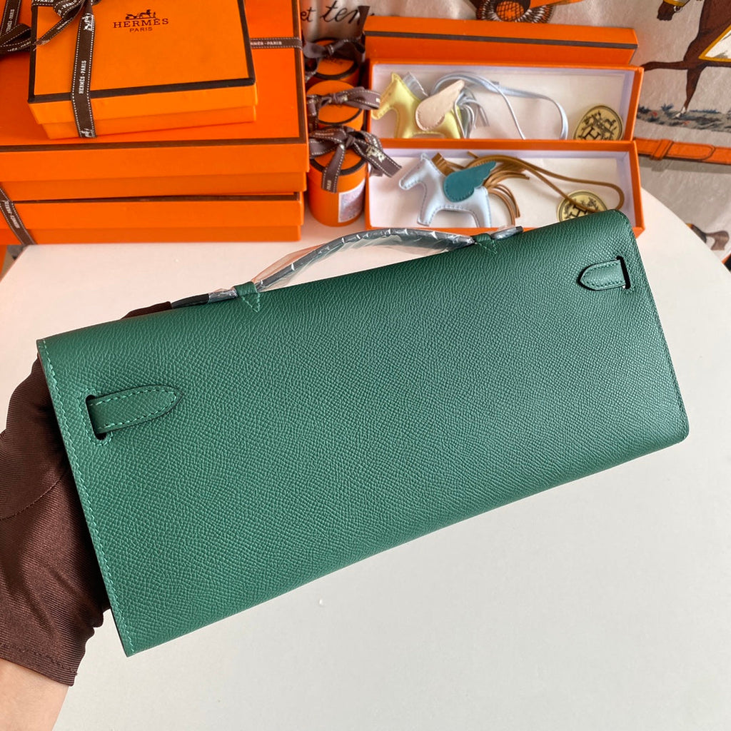 HERMES KELLY CUT 31 IN GREEN FOREST CALFSKIN WITH SILVER HARDWARE