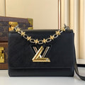 LOUIS VUITTON TWIST MM 23 IN BLACK EPI LEATHER GOLD AND SILVER HARDWARE
