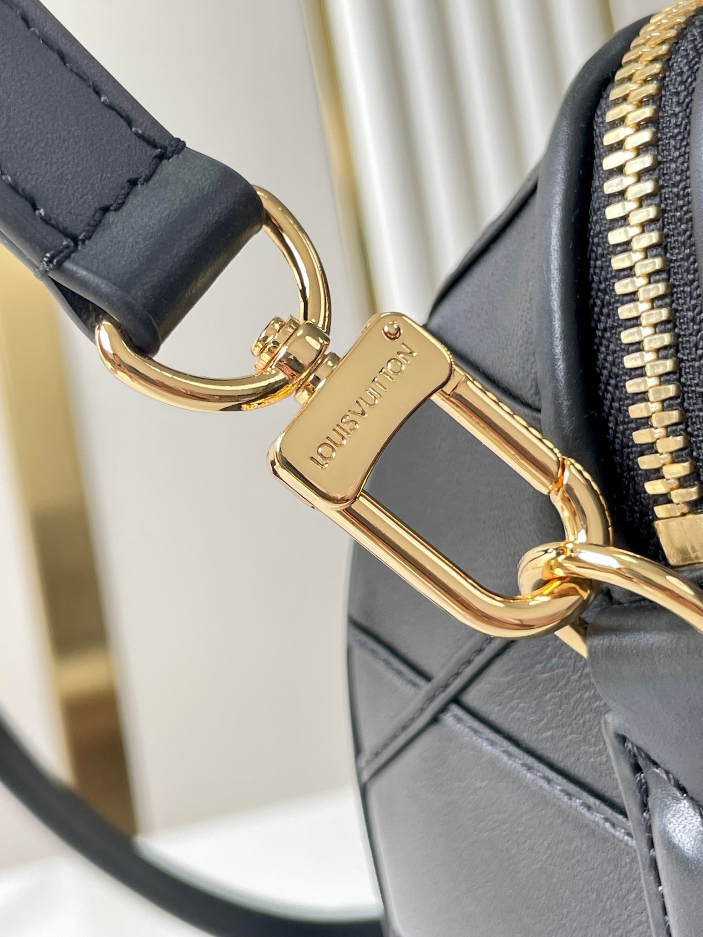 LOUIS VUITTON SPEEDY BANDOULIÈRE 25 WITH CRISS CROSS PATTERN IN BLACK LAMBSKIN