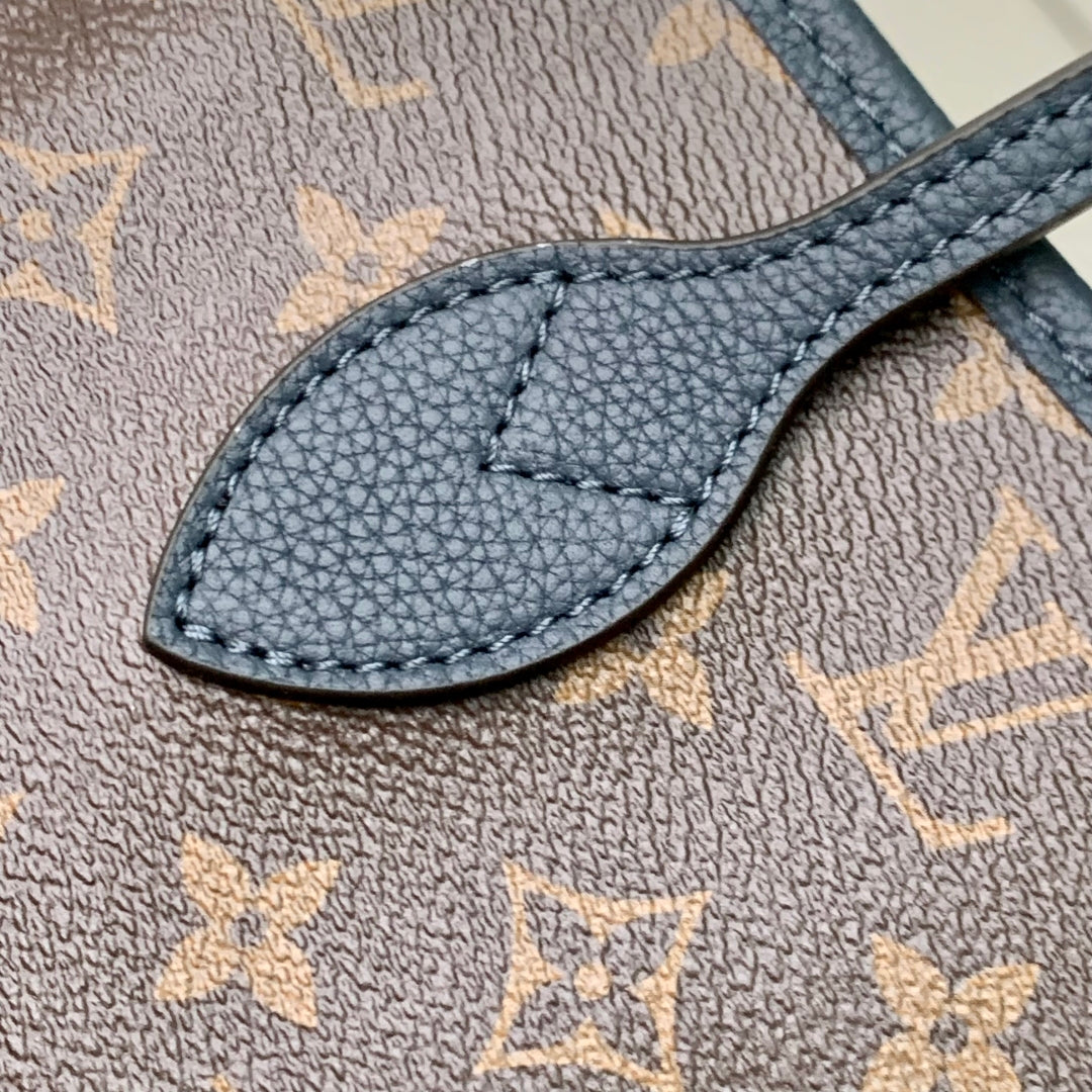 LOUIS VUITTON NEVERFULL BANDOULIÈRE INSIDE OUT BB 31 IN BROWN MONOGRAM CANVAS AND BLACK CALFSKIN