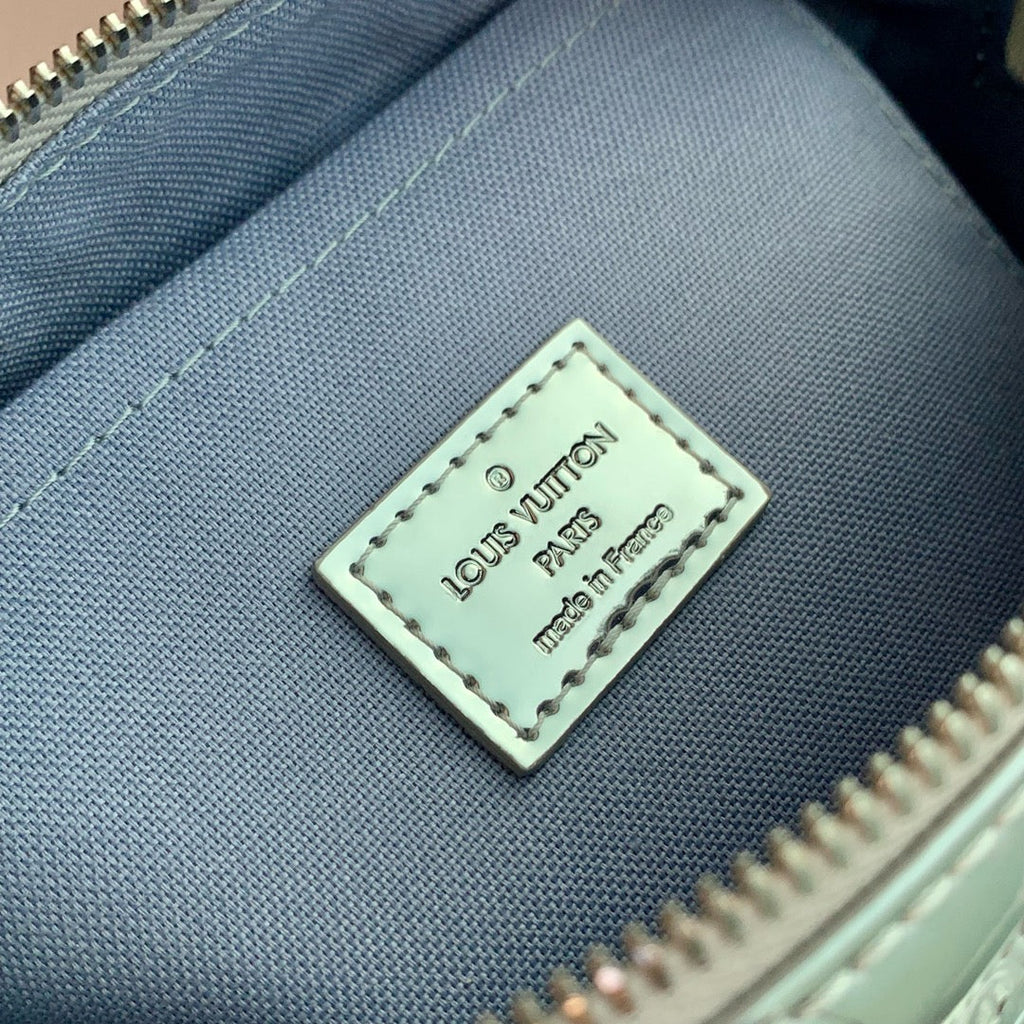 LOUIS VUITTON SPEEDY BANDOULIÈRE 20 IN SILVER MONOGRAM EMBOSSED CALFSKIN