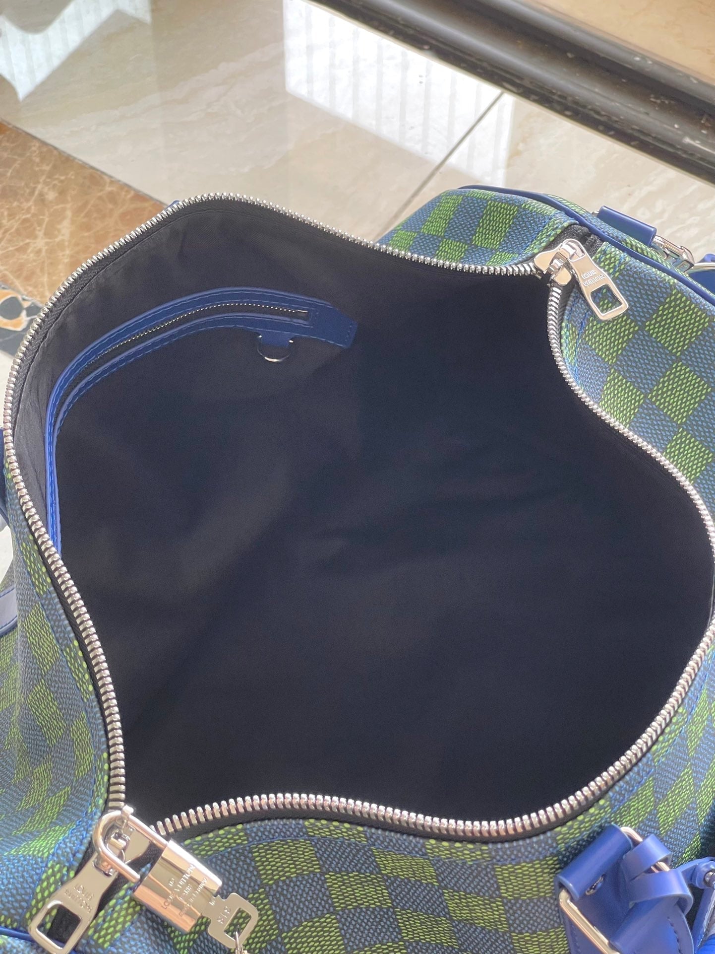 LOUIS VUITTON KEEPALL BANDOULIÈRE 45 IN BLUE GREEN DAMIER HERITAGE COATED CANVAS